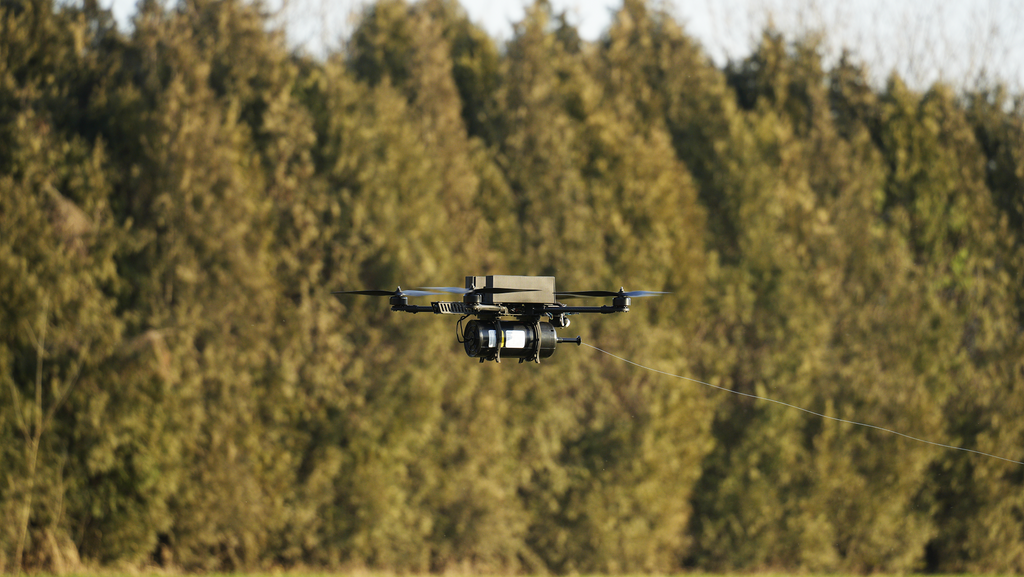 RaignV XCD-7 - X-shaped quadcopter configuration with fiber-optic communication for anti-jamming FPV flight and remote control & telemetry