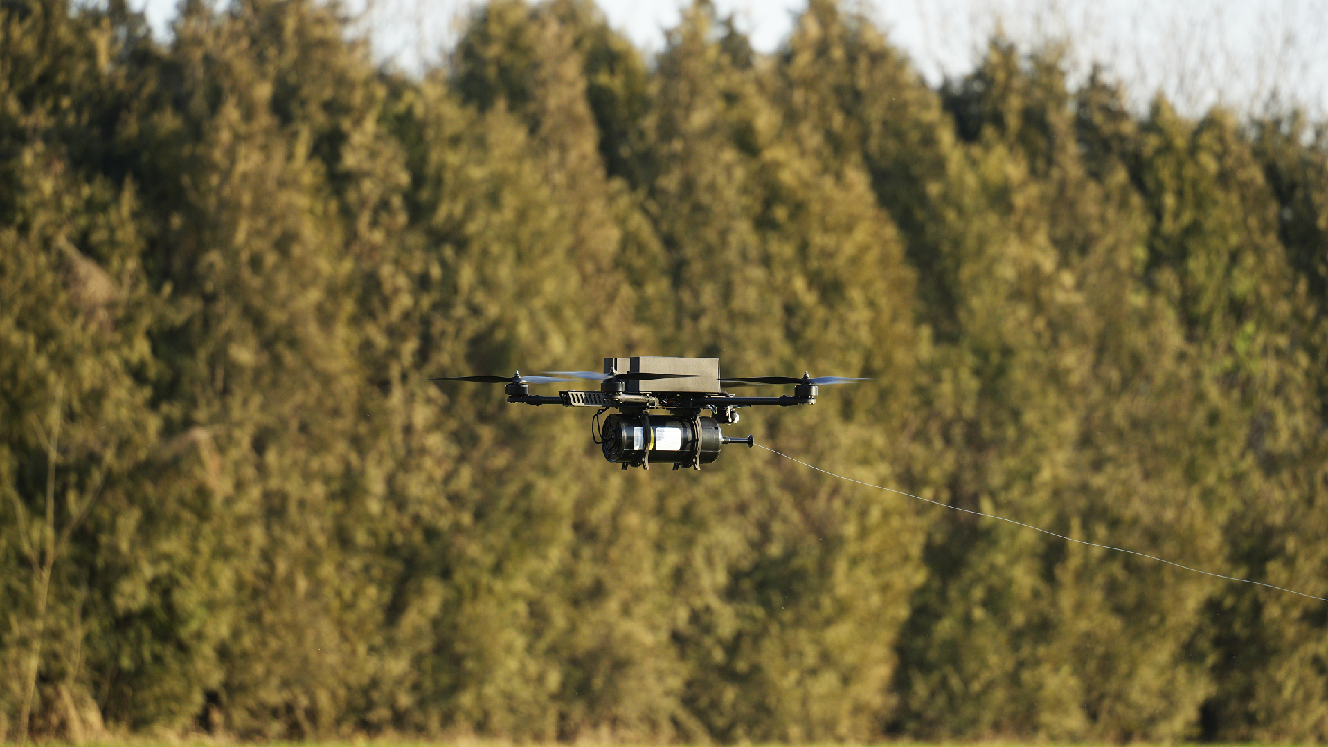 RaignV XCD-7 - X-shaped quadcopter configuration with fiber-optic communication for anti-jamming FPV flight and remote control & telemetry